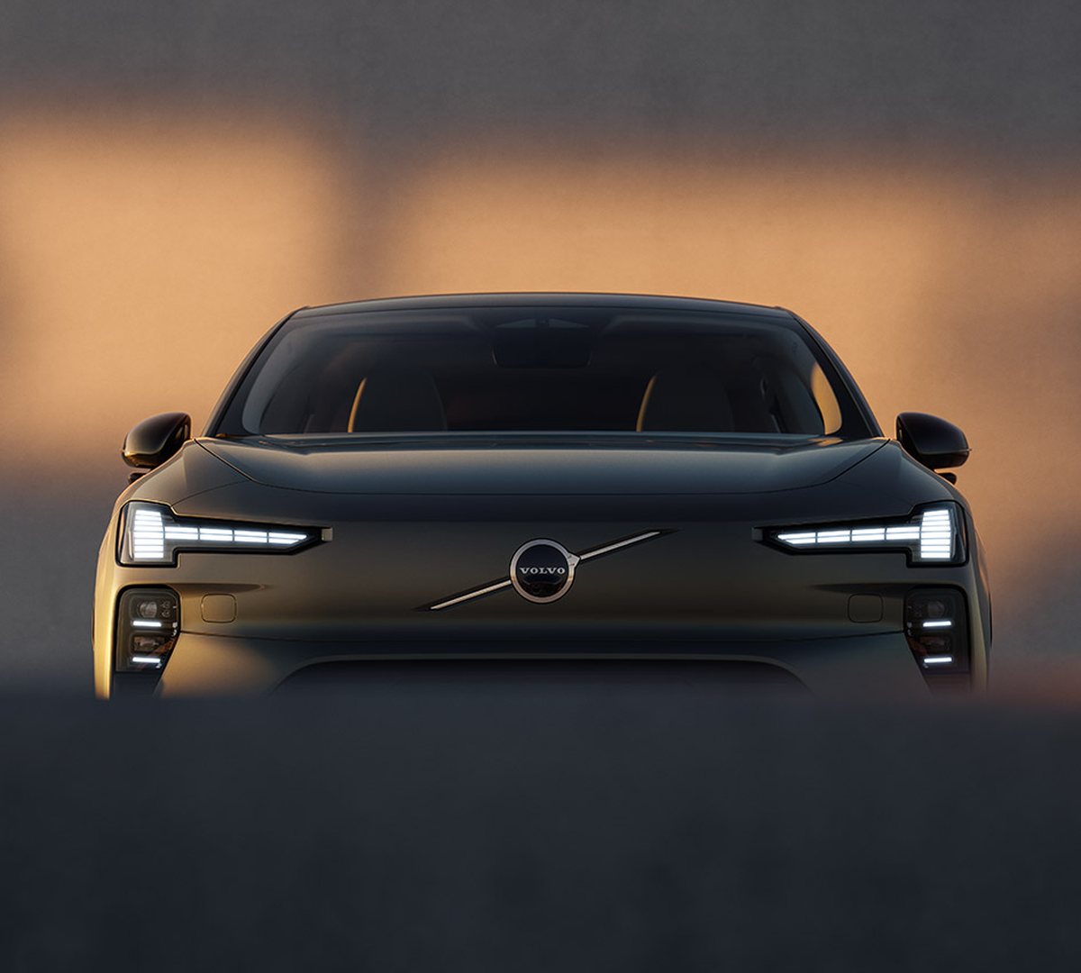Face avant du Volvo EX60, signature lumineuse allumée